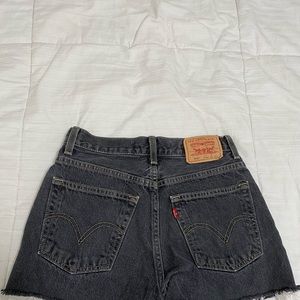 Black/Gray Levi’s, cut off shorts 26